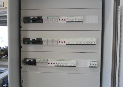 Three electrical panels during their manufacturing process in our company's laboratories.
